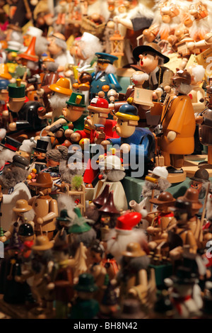 wooden incense smokers from Erzgebirge (Germany) on Christmas market Stock Photo