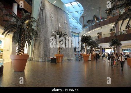 Waterfall Inside of the Dubai Mall, worlds largest shopping mall. Dubai, United Arab Emirates Stock Photo