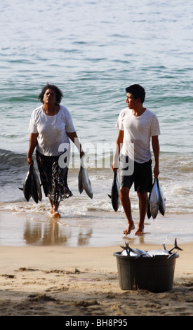 Fish Ladies on beach Escondido Oaxaca Mexico Stock Photo