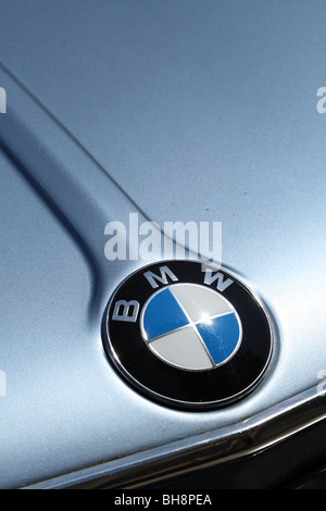 BMW Car Badge on Bonnet of Metallic Silver Classic '2002 Automatic' Car in Richmond-upon-Thames, Surrey, United Kingdom. Stock Photo