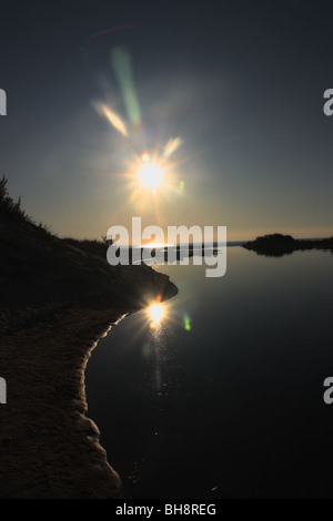 Sunset over Big Sable River near Lake Michigan Stock Photo