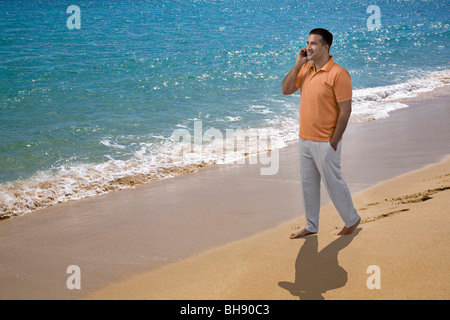 Man talking on the beach Stock Photo