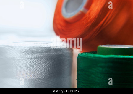 Different coloured spools Stock Photo