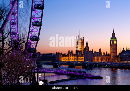 Millennium Wheel, River Thames Big Ben and the houses of parliament at night from the south bank, London, England, europe Stock Photo