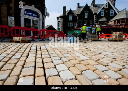 Modern cobblestone being laid Stock Photo