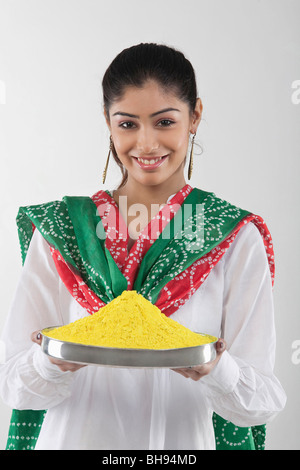 Woman holding a tray of colours Stock Photo