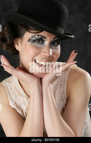 Portrait of a Smiling Burlesque Performer Wearing a Bowler Hat