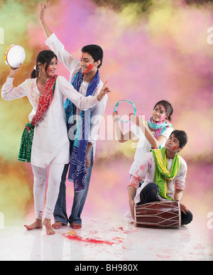 Friends enjoying Holi Stock Photo