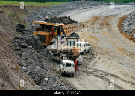 Vehicles working in a quarry in Northumberland, UK Stock Photo - Alamy