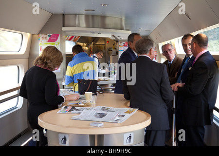 passengers in cafe carriage car of RENFE high speed train, Spain Stock Photo