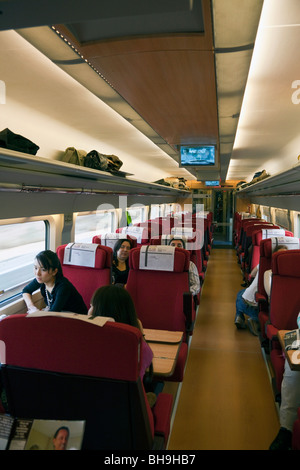 passengers in carriage on board RENFE high speed train, Spain Stock Photo