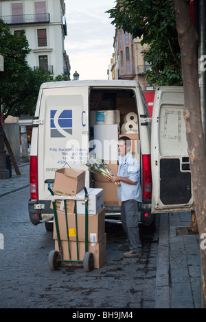 delivery man with flowers, central Seville, Andalusia, Spain Stock Photo