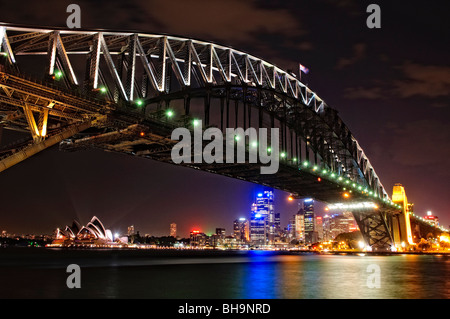 SYDNEY, Australia - SYDNEY, Australia - Night shot of Sydney Harbour Bridge and skyline of Sydney city looking back towards Dawes Point and taken from Milsons Point. The Sydney Opera House is at extreme left. Dawes Point is at right Stock Photo