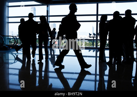 An abstract view of shoppers shopping in the International Finance Centre mall in Hong Kong. Stock Photo