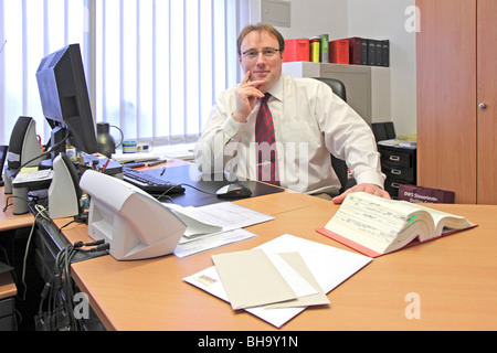 young businessman sitting in his office Stock Photo