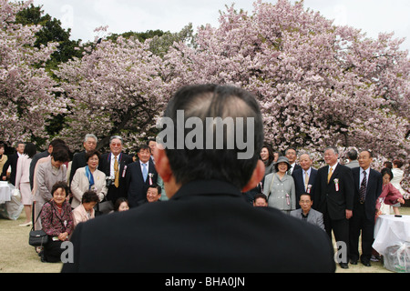 Guests at the 'Sakura Hanami' (cherry blossom flower viewing) garden party hosted by Prime Minister Junichiro Koizumi, Tokyo Stock Photo
