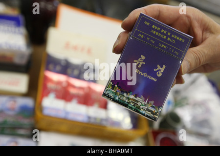 Rainbow Trading Company ( a North Korean speciality bookstore) shows off North Korean products for sale. Tokyo. Stock Photo