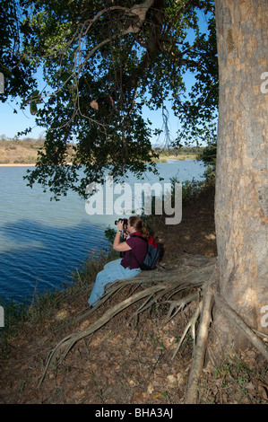 Tourists enjoy the various scenic vistas in Zimbabwe's Umfurudzi Safari Area. Stock Photo