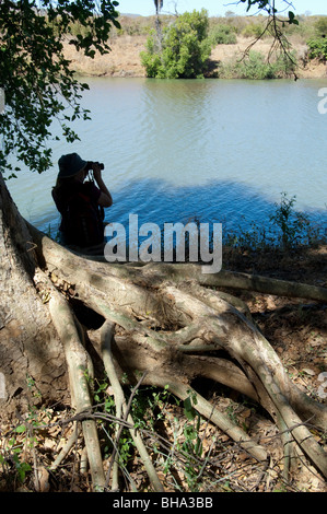 Tourists enjoy the various scenic vistas in Zimbabwe's Umfurudzi Safari Area. Stock Photo