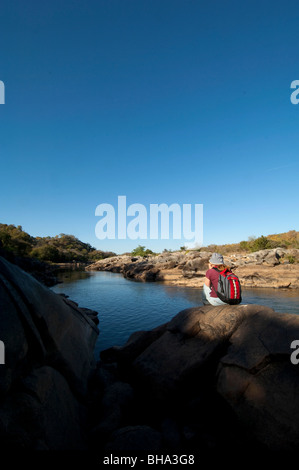 Tourists enjoy the various scenic vistas in Zimbabwe's Umfurudzi Safari Area. Stock Photo