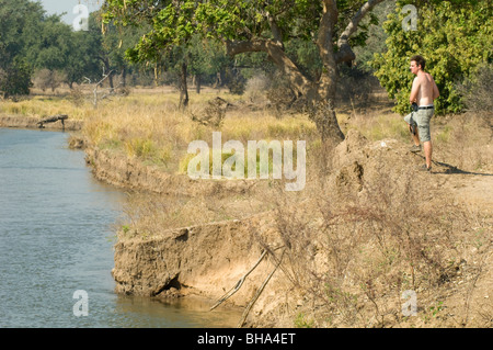 Tourists enjoy the multitude of views over the Zambezi River in Zimbabwe's Mana Pools National Park. Stock Photo