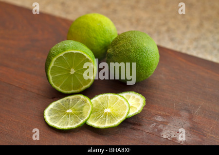 Sliced fresh limes Stock Photo