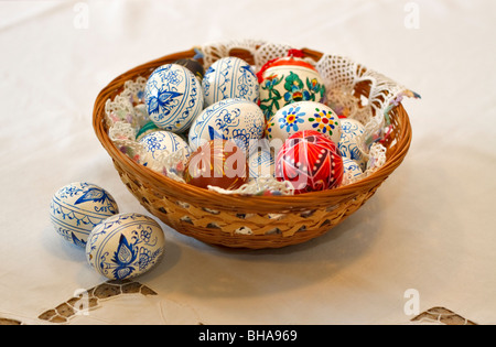 Basket of hand decorated traditional Easter eggs Stock Photo