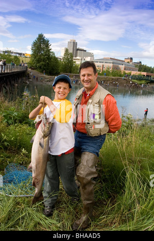 Family Poses for Picture w/Caught King Salmon AK SC/nShip Crk Anchorage Summer Slam'nSalmon Derby