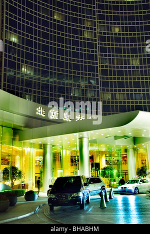 Beijing, China - Luxury Hotels, Grand Hyatt Hotel, Entrance, Lit up at Night, Oriental Plaza, Wangfujing Street Stock Photo