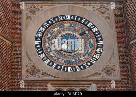 The Astronomical clock commissioned by Henry VIII in Clock Court at Hampton Court Palace. The outer ring shows hours of the day, Stock Photo