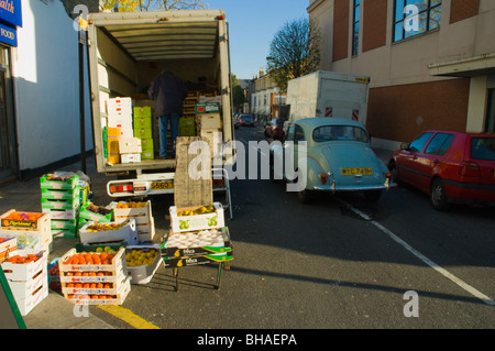 Unloading at North End Road Market west Kensington London England UK Europe Stock Photo