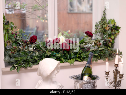 Christmas images. Including Christmas dining tables,front doors,snowy houses,mantlepieces,decorations,trees,wreaths,fireplaces, Stock Photo