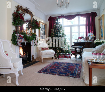 Christmas images. Including Christmas dining tables,front doors,snowy houses,mantlepieces,decorations,trees,wreaths,fireplaces, Stock Photo