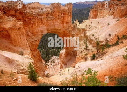 Red rocks forming natural arch in Bryce Canyon National Park, Utah, U.S.A. Stock Photo