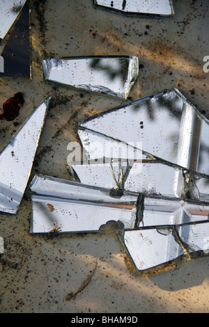 broken mirror on floor ground Stock Photo