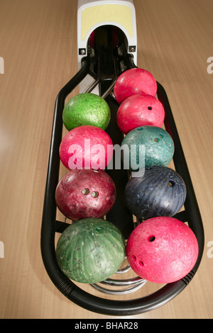 Bowling balls perspective in game center wooden floor Stock Photo