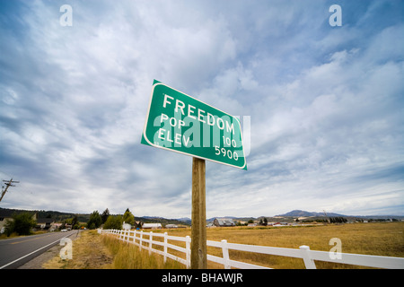 Town Sign Freedom Wyoming Idaho border town. Population 100. Elevation 5900 Stock Photo