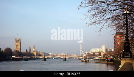 View down the River Thames towards the Houses of Parliament from Vauxhall Bridge Westminster London England UK Stock Photo