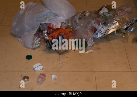 Split kitchen rubbish bag 2 Stock Photo - Alamy