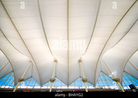 Denver Airport tent-like roof structure. Tensile fiberglass fabric. International Jeppesen terminal interior. US USA Stock Photo