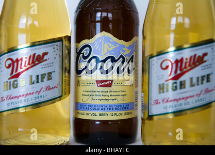 A grouping of Coors and Miller High Life Beer bottles Stock Photo