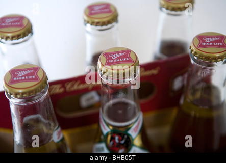 A grouping of Miller High Life Beer Bottles.  Stock Photo