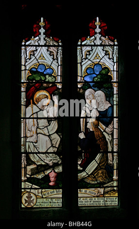A stained glass window depicting The Three Maries seeing the angel at the tomb of Jesus Christ, Hawnby Church, North Yorkshire Stock Photo