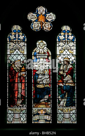 A stained glass window depicting The Nativity and the Three Magi, St Cuthbert's Church, Kildale, North Yorkshire Stock Photo