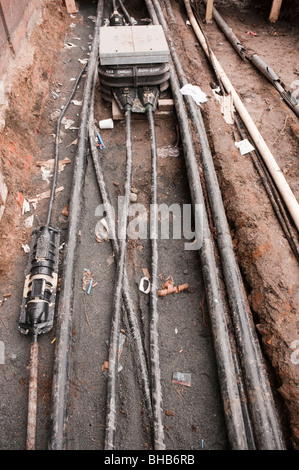 Exposed electrical, gas and telecommunications cables, and water pipes ...