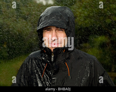A man getting soaked in the rain Stock Photo