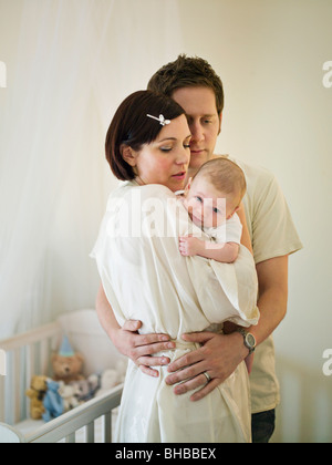 A mother holding a new born baby Stock Photo
