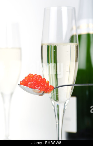 red caviar and glasses of champagne on an old wooden table Stock Photo ...