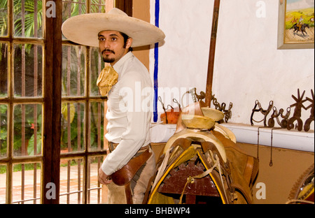 Charro (cowboy) with saddle in Guadalajara, Jalisco, Mexico Stock Photo