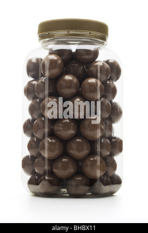 Chocolate covered almonds in French coin dispenser candy machines Stock  Photo - Alamy
